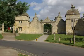 Lodges, gates and arch- way to Old Campden Manor