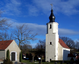 St. Martinskirche und Kirchhof, ein Grabmal an der östlichen Kirchenwand, Denkmal für die Gefallenen des Ersten Weltkrieges und Soldatengrabanlage für Gefallene des Zweiten Weltkrieges sowie Einfriedungsmauer und Kirchhofstor Kirchweg