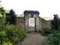 Gateway in bounding wall opposite kitchen gardens