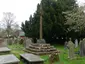Cross and stepped base east of path to south porch of Church of St John the Baptist Cross and stepped base east of path to south porch of Church of St John the Baptist
