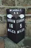 Milestone In Front Of Number 12