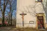Wooden cross in Vysoké Žibřidovice by the church wall
