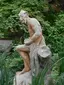 Vodník statue near the gazebo in the Artist garden in Nusle
