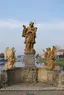 Statue of John of Nepomuk with angels on Písek Stone Bridge Statue of John of Nepomuk with angels on Písek Stone Bridge