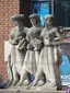 Drie staande figuren